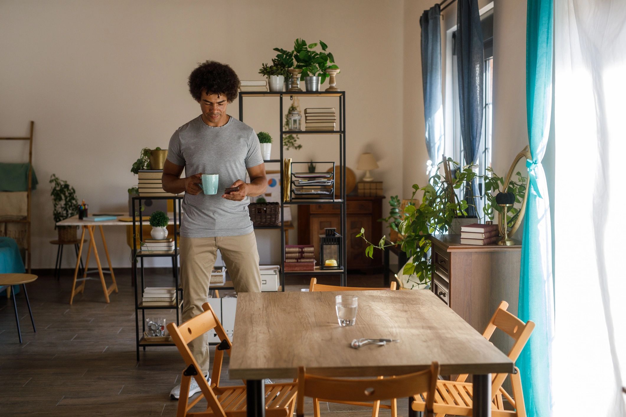 Homeowner in a tidy kitchen representing reliable home appliance care