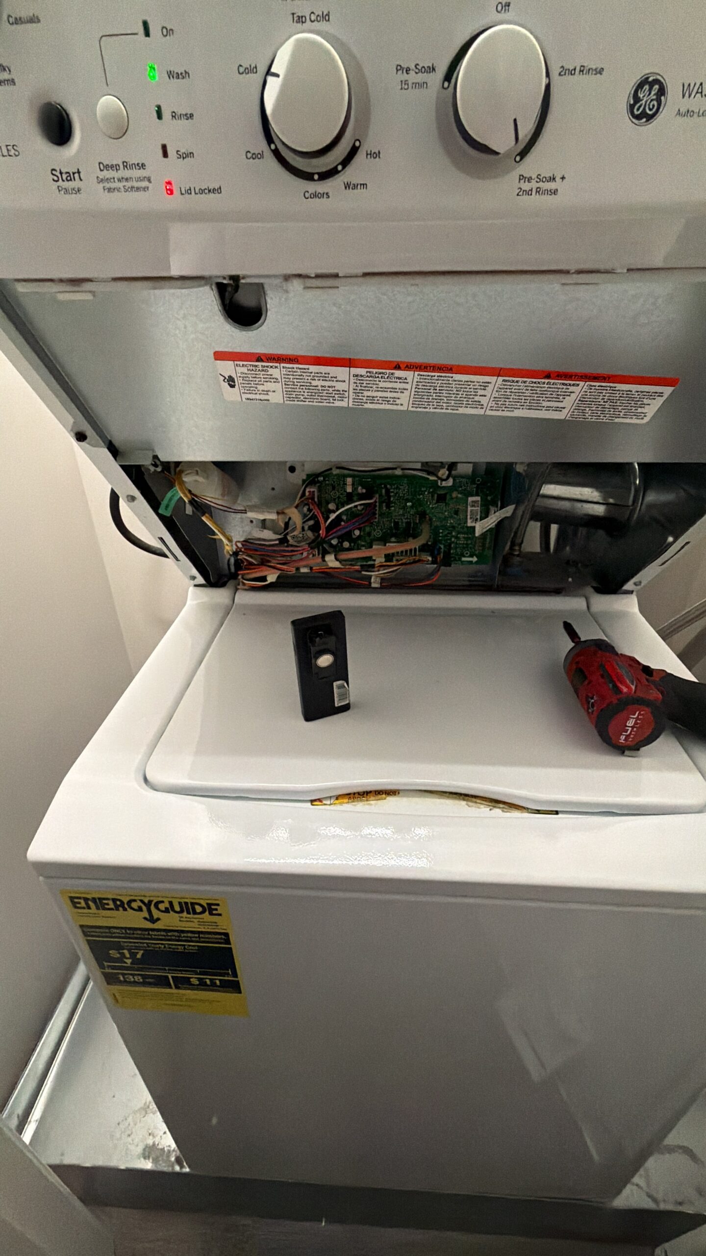 Opened appliance control panel interior used for in-depth diagnostics service
